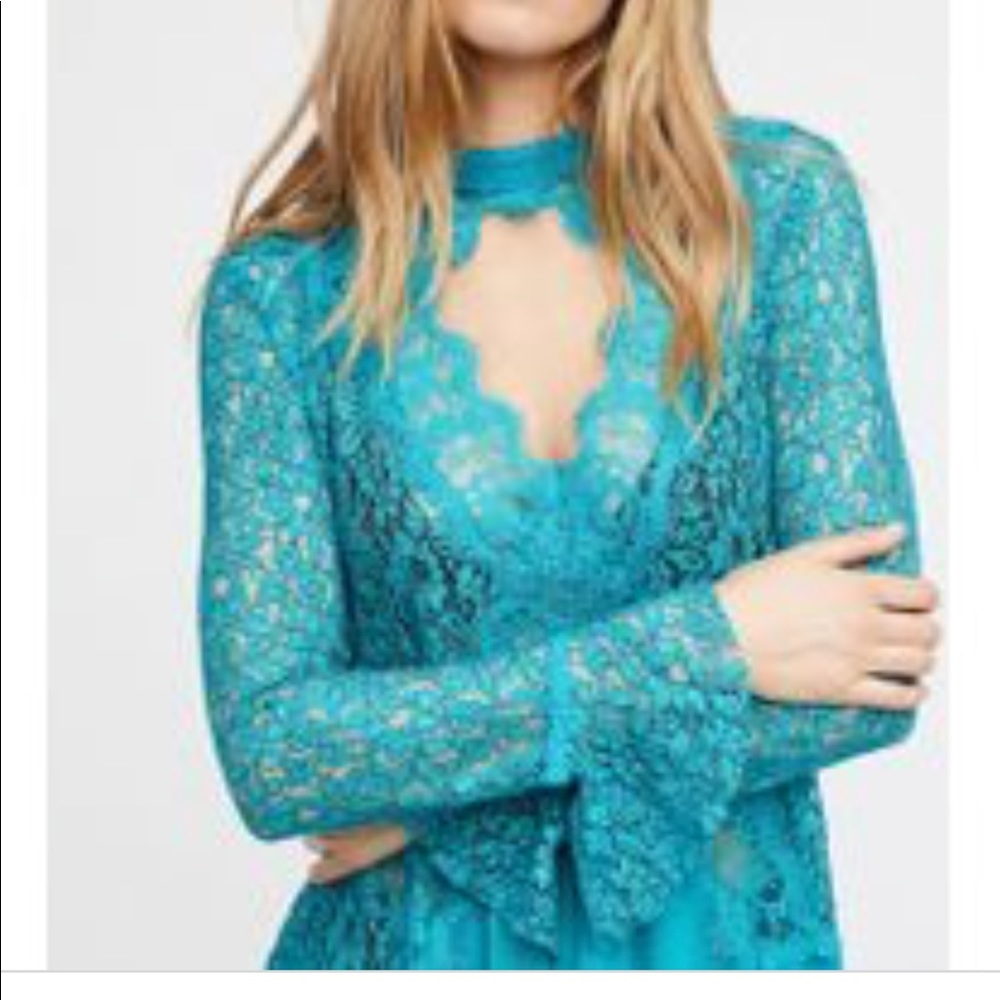 Free people tell a tale lace tunic